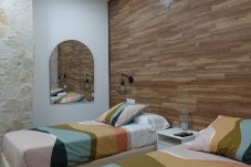 Alquiler por habitaciones en El Cuervo - Habitación doble con dos camas individuales